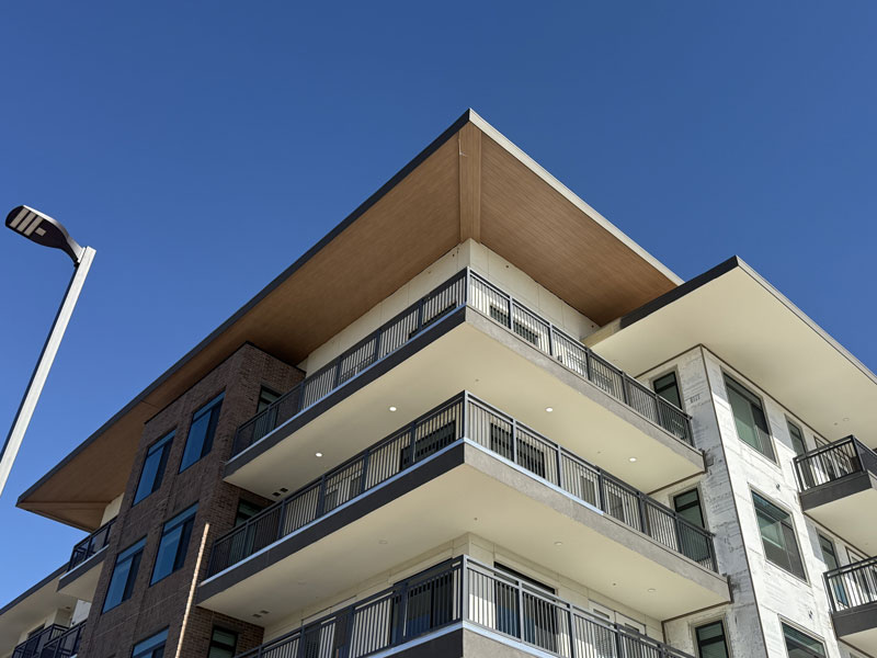 Cladding installed on multi-story condominiums