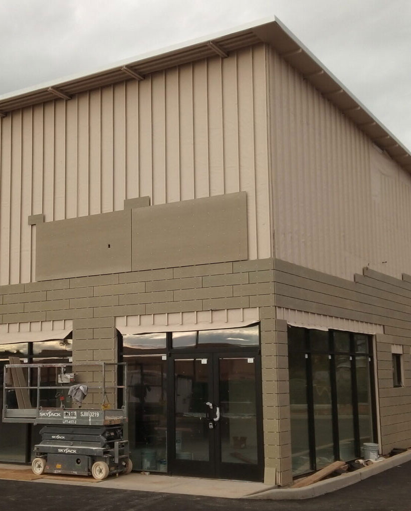 Installation of cladding on building